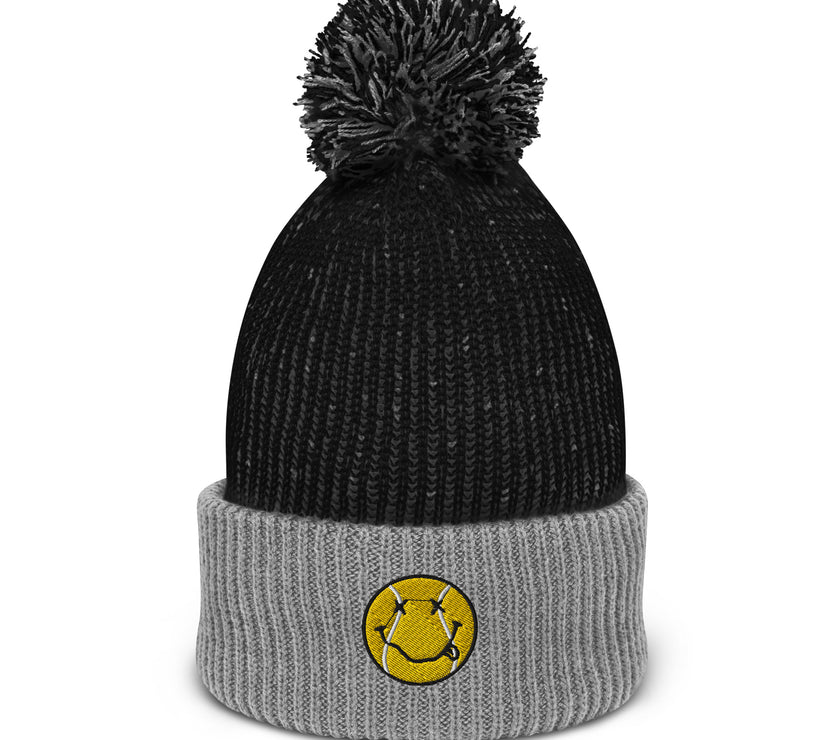 Smiling Tennis Ball by CoVA Tennis Speckled Pom-Pom Beanie